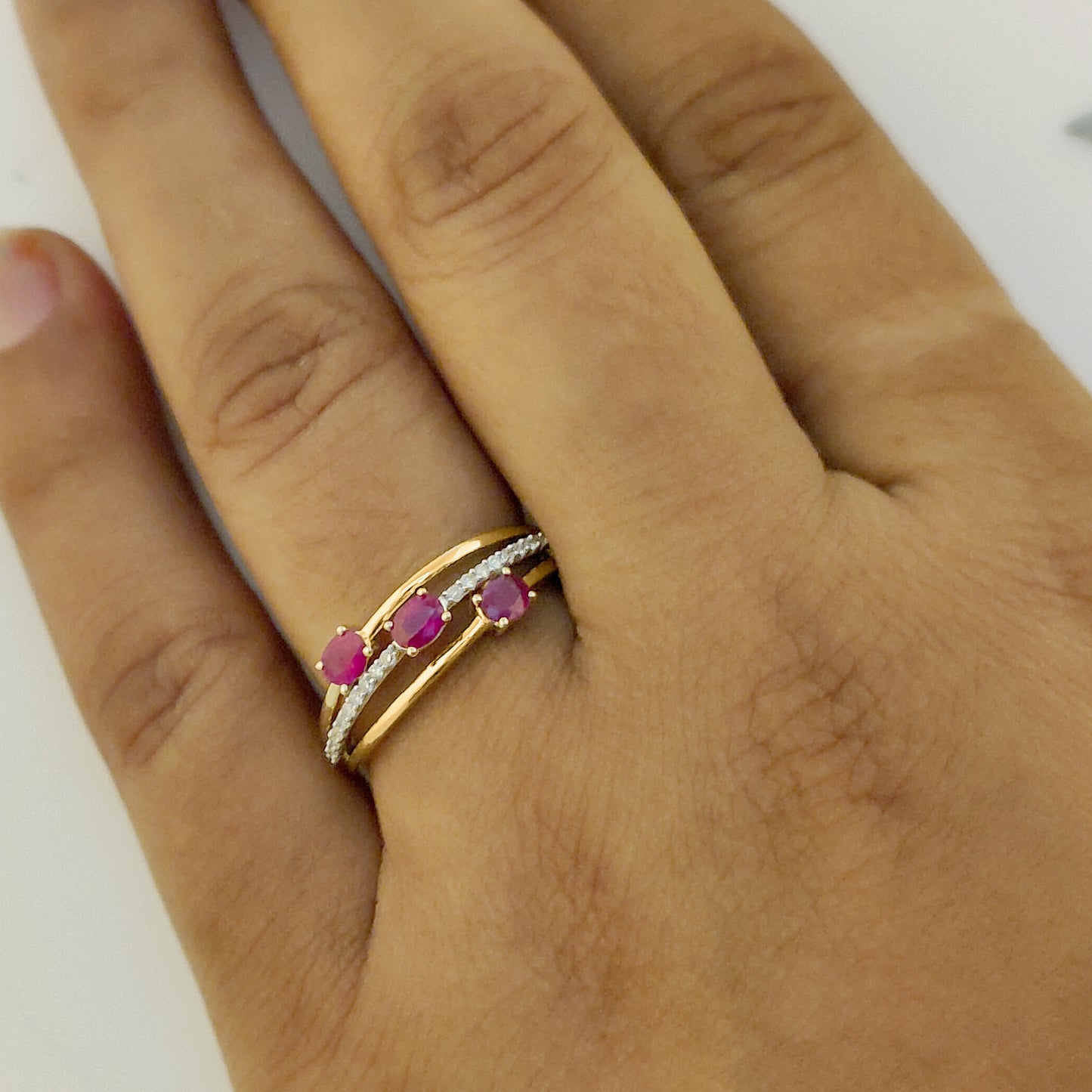 Ruby Split Shank Three Stone Ring in 10KT Gold