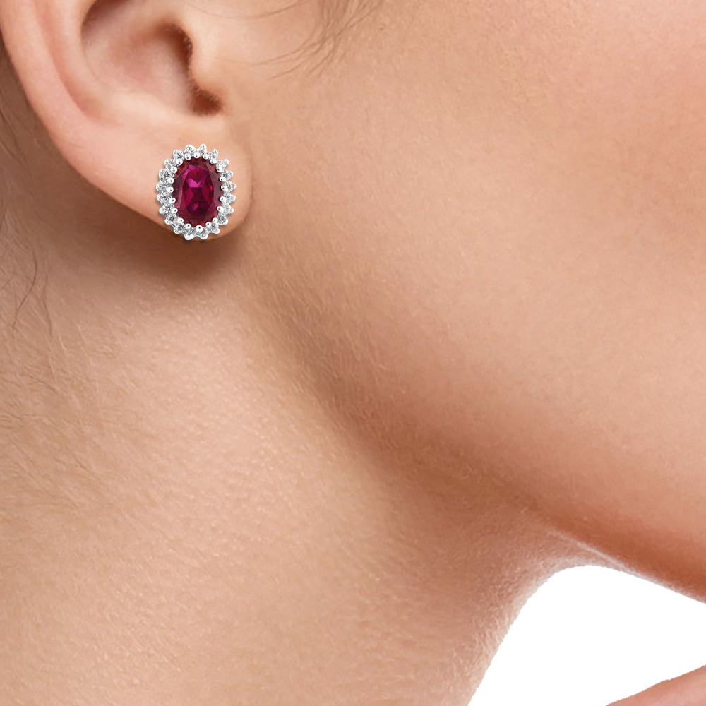 Oval Ruby Halo Stud Earrings in 10K Gold